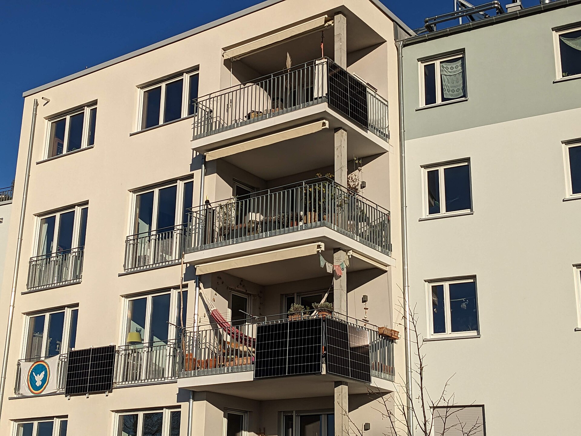 Solar panels hanging on balcony railings